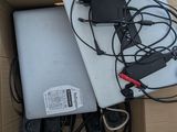 a box that has a laptop and other electronics in it