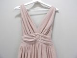 a picture of a dress hanging on a hanger