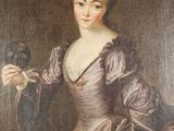un vieux tableau représentant une femme en robe violette tenant un oiseau