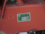 an image of a red machine with a label on it
