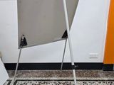 two chairs sitting next to each other in a room