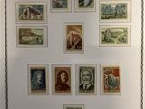 framed picture of a collection of stamps with a picture of a man and a woman