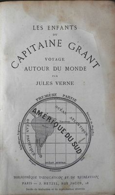 an old book with a map of the world on it