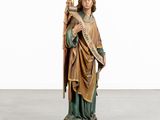 an image of a statue of a man holding a harp
