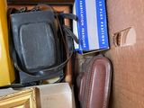 a box full of luggage and other items in it