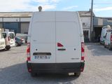 a white van that is parked in a parking lot