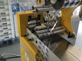 a machine that has a roll of tape on it