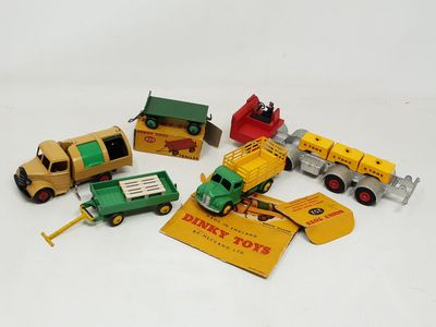 a lot of toy vehicles that are sitting on a table