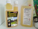 a bottle of desherrantt sitting next to a bottle of dehydraant