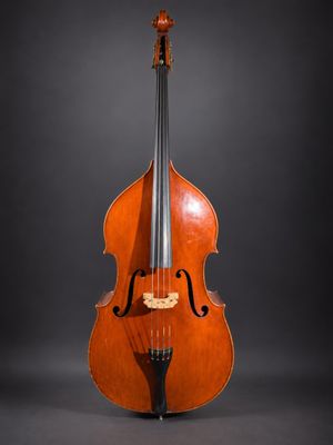 an old cello on a black background