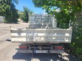 a truck that is parked on the side of the road