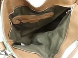 the inside of a purse with two zippers on the inside of it