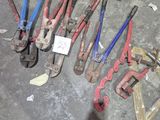 a lot of tools that are laying out on the floor
