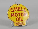 yellow shell motor oil sign on clear acrylic stand