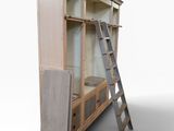 an image of a ladder leaning against a bookcase