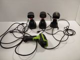 four different types of corded tools sitting on a table