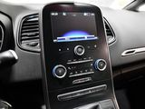 a car dashboard with a cell phone in it