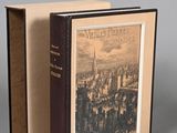an old book with a picture of a city in it