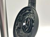a close up of a pair of headphones hanging from a pole