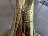 a close up of a brass bell on a table