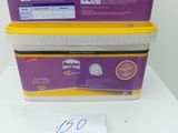 two plastic containers sitting on a table with a price tag