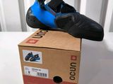 a box with a pair of shoes on top of it