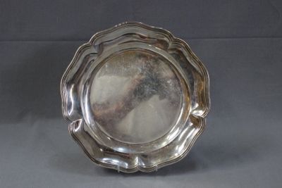 a silver plate that is sitting on a table