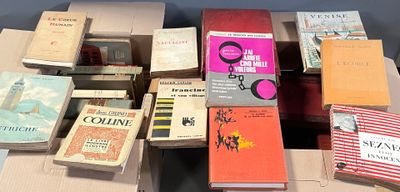 a lot of books that are on a table