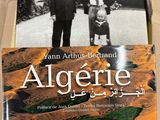 an image of a book with a picture of two men standing next to each other