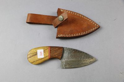 two knives that are sitting on a table