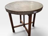 the table is made of wood and has a metal top