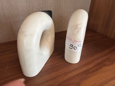 a bottle of milk and a bottle of milk on a table
