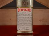 a bottle of beefeater gin sitting on a table