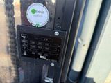 a close up of a control panel on the side of a bus