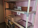 a shelf that has a lot of items on it