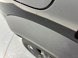 a close up of a car door handle with a sticker on it