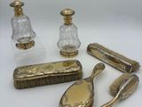 a lot of antique items that are on the table