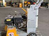 a machine that is sitting on a pallet in a warehouse