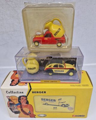 three toy cars are stacked on top of each other in a box