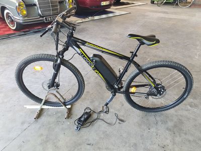 a bicycle that is parked in a garage