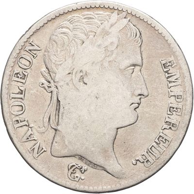 a close up of a coin with a woman ' s face on it