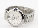 a close up of a wrist watch with a white dial