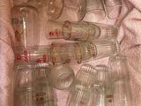 a lot of empty empty glass bottles in a box