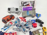 a lot of toy cars that are sitting on a table