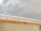 a picture of a sign on the side of a building
