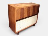 an image of a wooden cabinet with a tiled top