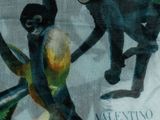 a painting of two monkeys playing with a frisbee