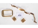 un ensemble de bijoux en or comprenant une ceinture, un bracelet et une bague