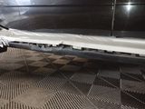 a close up of a car ' s front bumper and bumper