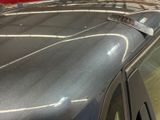 a close up of a car ' s roof with a sticker on it